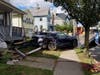 A four-car accident caused one vehicle to crash into a home in Garwood Sunday morning.