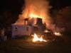 Firefighters battled a two-alarm house fire early Thursday morning on River Road in Hillsborough.