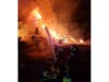 Firefighters battled a two-alarm house fire early Thursday morning on River Road in Hillsborough.