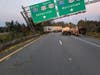 A tractor-trailer crashed on I-78 taking out an overhead sign for I-287 and spilling 80 gallons of fuel in Somerset County on Sunday morning.