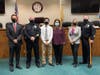 Pictured: Mayor Tomson, Lieutenant Carney, his family, Committeewoman McCauley and Chief McMahon.
