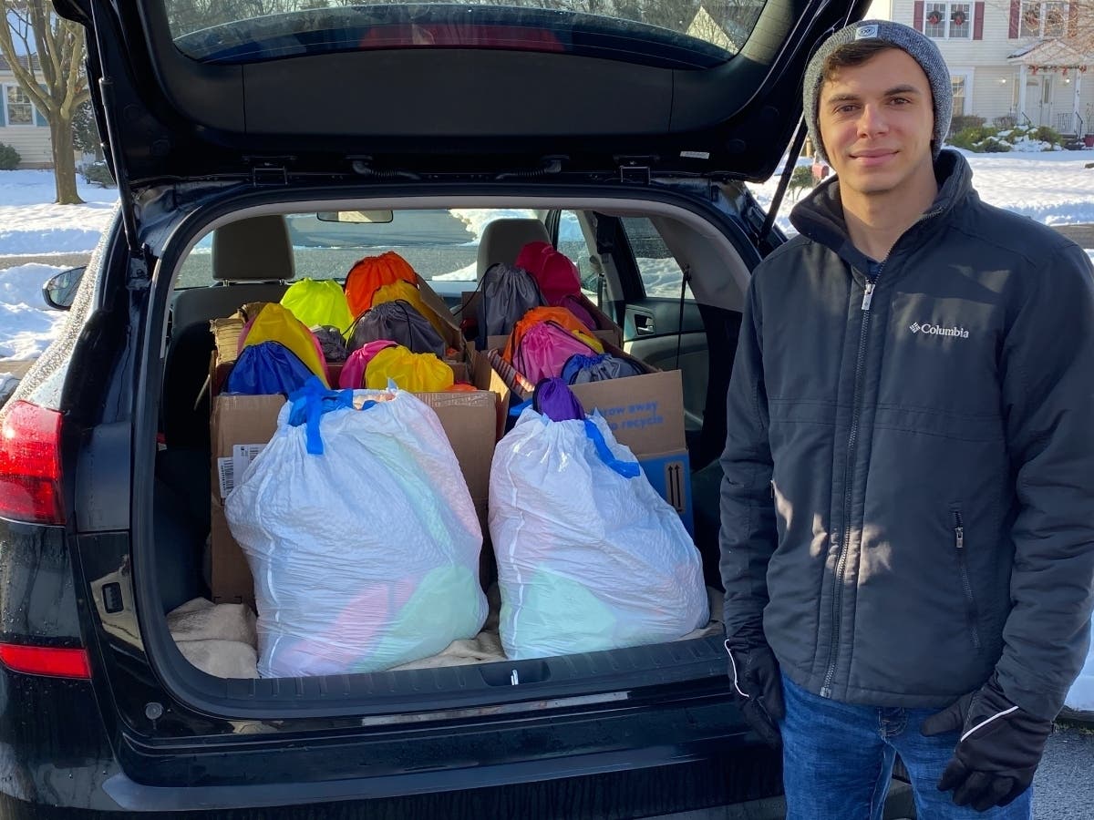 Hillsborough High School graduate and entrepreneur Michael Panchery raised more than $600 by selling cell phone cases to help 96 homeless people this holiday season.