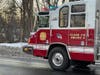 A driver was rescued by Clark firefighters after the dump truck overturned on icy roads in the township.