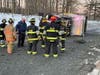 A driver was rescued by Clark firefighters after the dump truck overturned on icy roads in the township.
