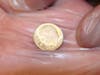 A 1959 dime found inside the time capsule.