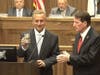 Mayor Sal Bonaccorso holds a can of rootbeer found near the time capsule.