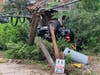 A Ram pickup truck had left the roadway, overturned, collided with a telephone pole/guardrail and stopped just short of hitting a Branchburg home.