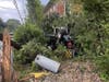 A Ram pickup truck had left the roadway, overturned, collided with a telephone pole/guardrail and stopped just short of hitting a Branchburg home.