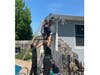 Beth Engleman and Jess Wolfenden of Animal Control Solutions and John from Coastal Wildlife Removal helped to rescue the baby raccoons.