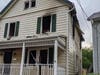 Two people were able to escape and a family dog died in a house fire early on Tuesday morning in Raritan.