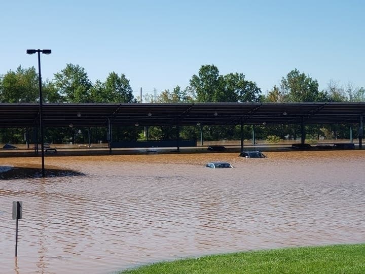 Floodwaters at the TD Bank parking lot and train tracks in Bridgewater on Sept. 2.