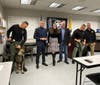 Bernardsville residents Dr. Caesar DePaço and Deanna Padovani-DePaço, Sheriff Darrin Russo, Sheriff’s Officer Michael Kromar & K9 Casanova along with Correction’s Officer Danier Soffer & K9 Caesar.