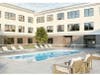 Rendering of the outdoor pool area at the apartment building.