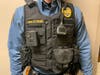 The photo depicts the body-worn cameras and the approximate placement on the
outer vest carrier.
