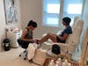 Cancer fighter Maureen getting pampered.
