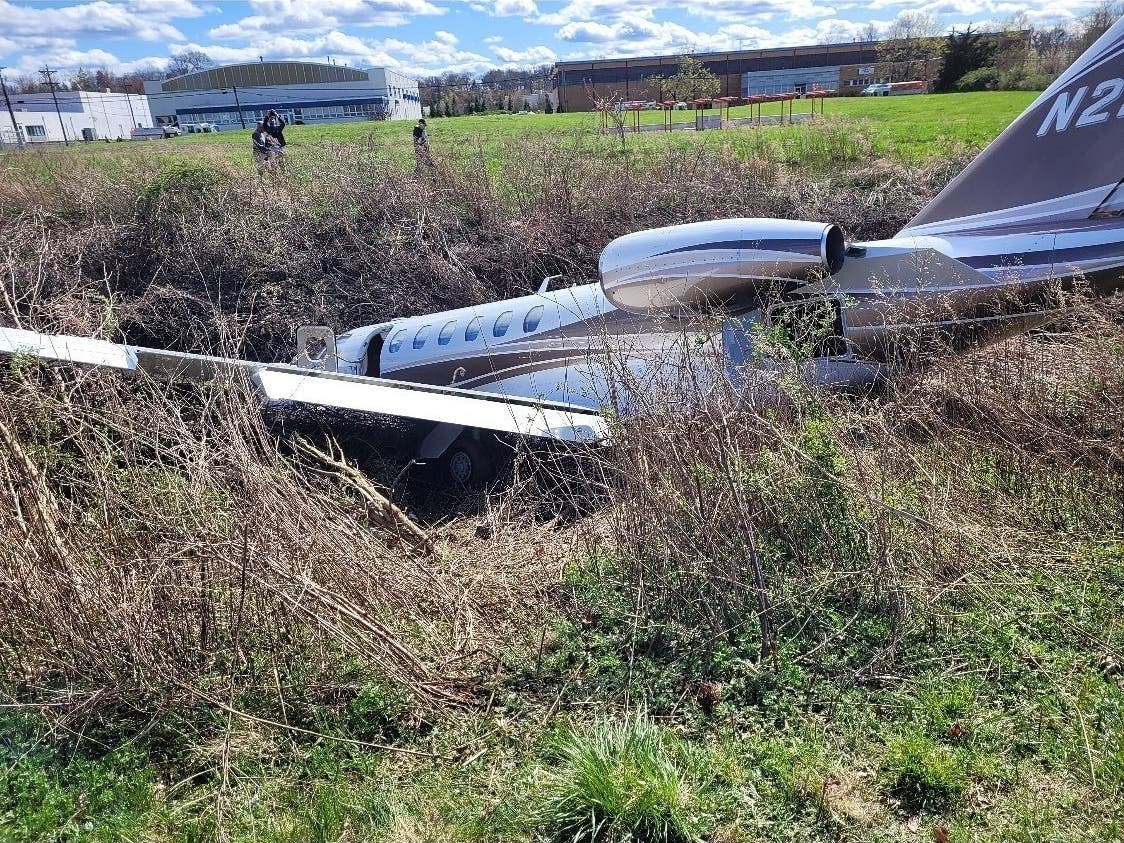 A plane trying to land on a runway in Essex County crashed into a drainage brook on Sunday leaving three people, including a Bernardsville man, uninjured.