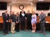 Pictured from left: Mayor Shawn Lipani, Officer Michael Liscik and his family, and Chief Mike McMahon.
