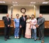 Pictured from left: Mayor Shawn Lipani, Officer Brian Polacik and his family, and Chief Mike McMahon.