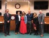 Pictured from left: Mayor Shawn Lipani, Officer Tiana Ramos and her family, and Chief Mike McMahon