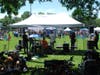 The band "The Counterfeiters" are seen playing hits from the '80 and '90s to a receptive and enthusiastic crowd.