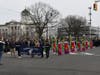 The Immaculata Color Guard pauses at the intersection near Main and Bridge Streets.