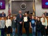 Pictured: Mayor Shawn Lipani, Stephanie Moore, and her students.