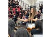 Maria Ramsay conducts the 8th grade orchestra.