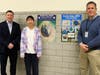 Edison 6th grader Celine Zhang poses with her winning poster as part of an Earth
Day Poster Contest with Edison principal Dr. Matthew Bolton (left) and Mr. Paterson.