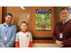 Roosevelt 7th grader Robert Dragon poses with his winning poster as part of an
Earth Day Poster Contest with Roosevelt principal Brian Gechtman (left) and Mr. Paterson.