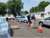 Water bottles being distributed in Bradley Gardens on Saturday. 