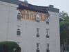 The building at the corner of Cedar Street and 2nd Avenue.