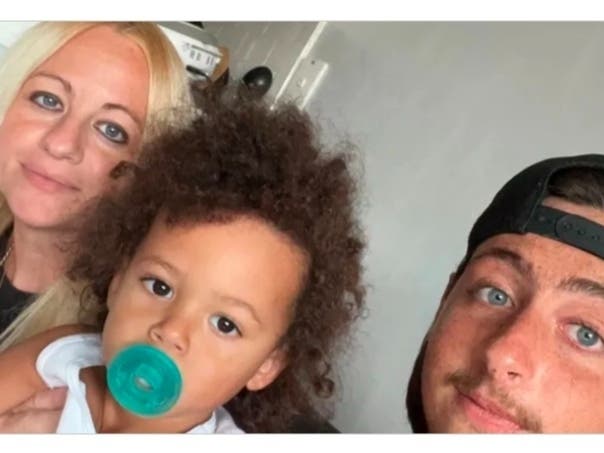 Joey Ricciardi with his 3-year-old brother and mother.