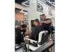 Andre Heredia cutting hair at the babershop.