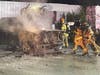 Firefighters take an aggressive attack to extinguish the fire.
