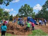 Ingredion volunteers helping to spread mulch around the playground.
