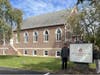 L-R, Brian Pascal, Construction Manager and Danielle Selby, Chief Learning Officer in front of the newly opened Hillsborough Apple Montessori.
