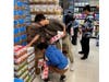 The stickers are placed on the products throughout the store and act as warning labels to inform the public of the consequences they can face if they provide or purchase alcohol for minors.