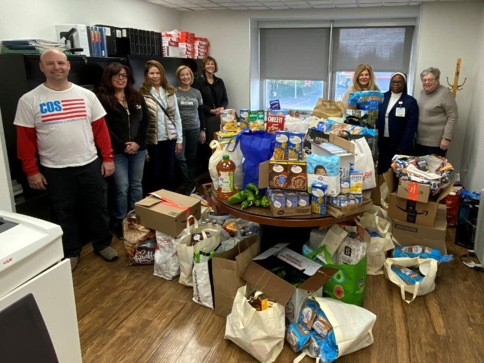 (left to right): Daniel Rogers, Sheila Malloy, Janet Hagan, Maureen Baumgaertner, Cara Trentadue, Donna Gallagher, Cheryl Brunetti, Sister Prudentia Osuji and Sister
Rosemary Moynihan of Trinitas.