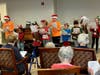 Bridgewater Troop 60028 singing to residents at Arbor Health Center at Laurel Circle.