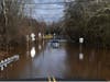 An abandoned car was caught in the flood waters on Station Road in Branchburg.