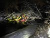 Firefighters from the Somerset County area work together to search the icy waters.