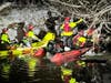Firefighters from the Somerset County area work together to search the icy waters.