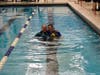 Head Coach Melanie Dupuis and Assistant Coach Andy West in the pool