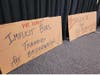 Signs placed at the conference.