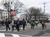 The honor guard leads the way down Main Street.