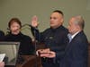​Officer Omar Caponpon with his family at the swearing-in ceremony on March 12.