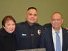 ​Officer Omar Caponpon with his family at the swearing-in ceremony on March 12.