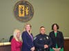 ​Officer Omar Caponpon with Mayor Jennifer Asay, Deputy Mayor Janice Fields, and Committeewoman Ana Duarte McCarthy.