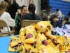 A station at Roosevelt Intermediate School’s Community Service Day with materials to make dog toys for a local rescue animal shelter.