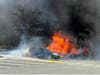 A car fire in the parking lot of 4 Millennium Way.